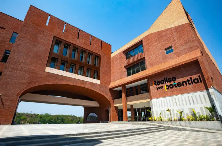 Boy and girl walking through college